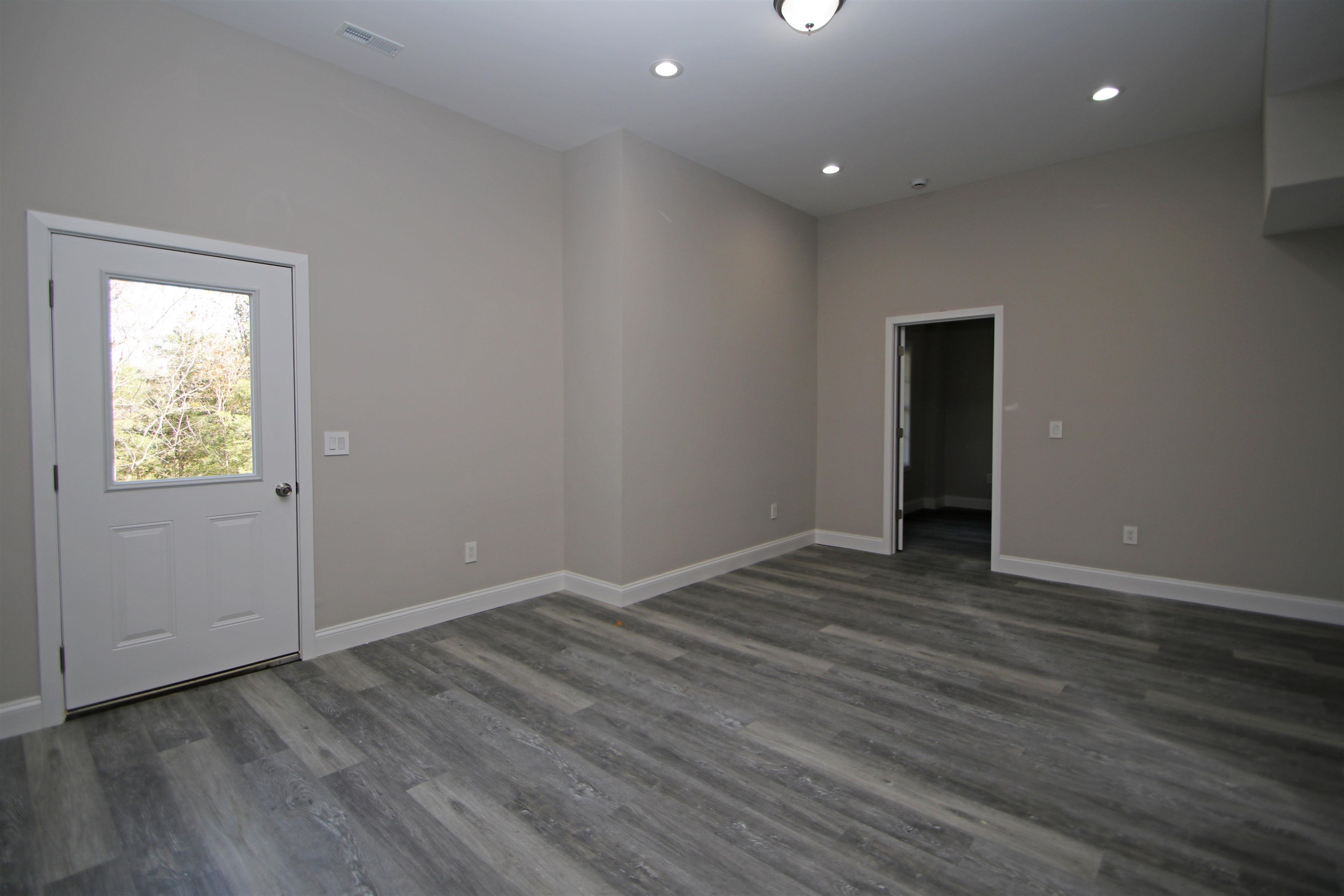 2060 Willow Hill Drive Harrisonburg, VA 22801 - Photo 32 of 43 an empty room with wooden floor and windows