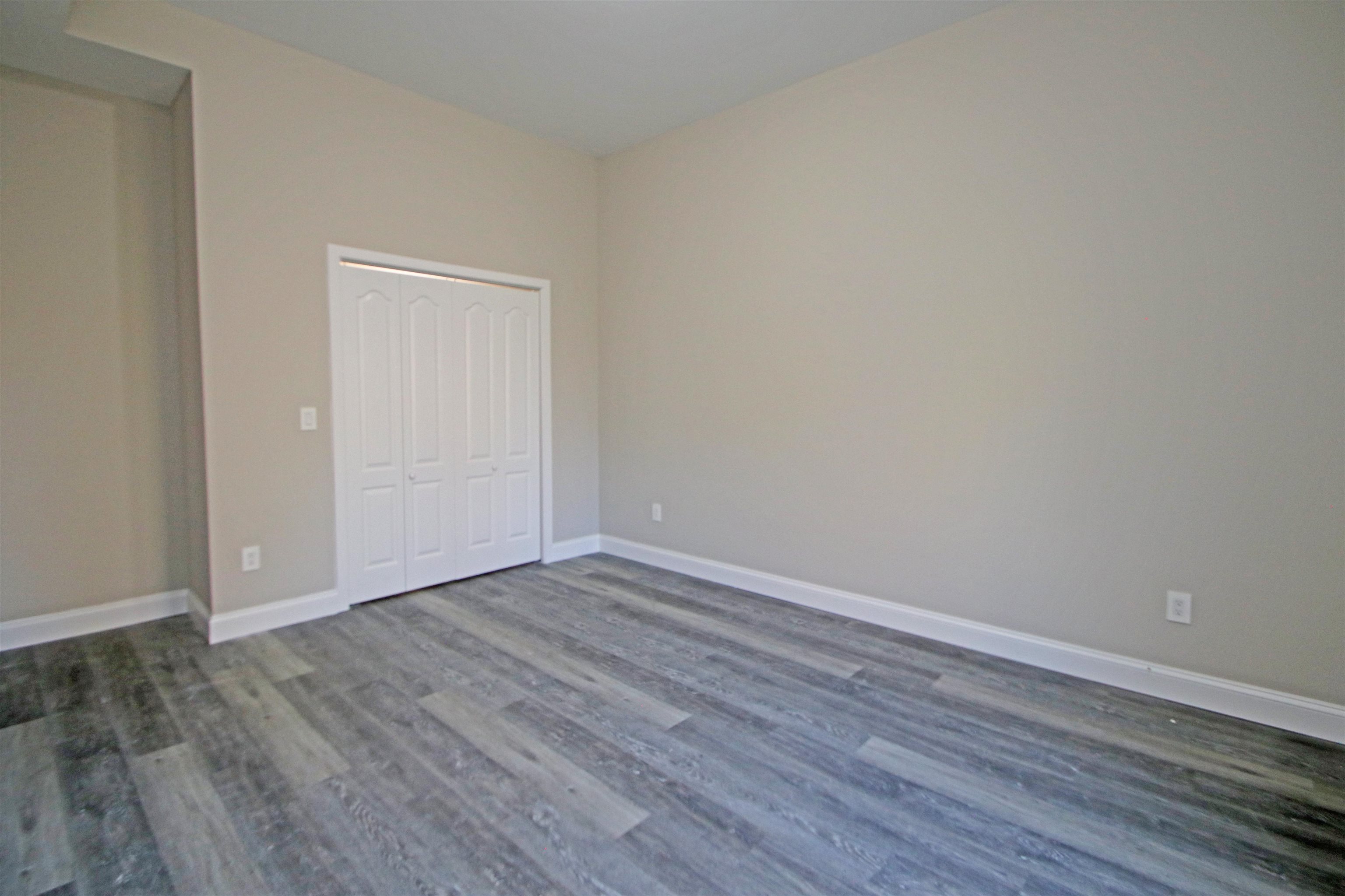 2060 Willow Hill Drive Harrisonburg, VA 22801 - Photo 35 of 43 a view of an empty room with wooden floor