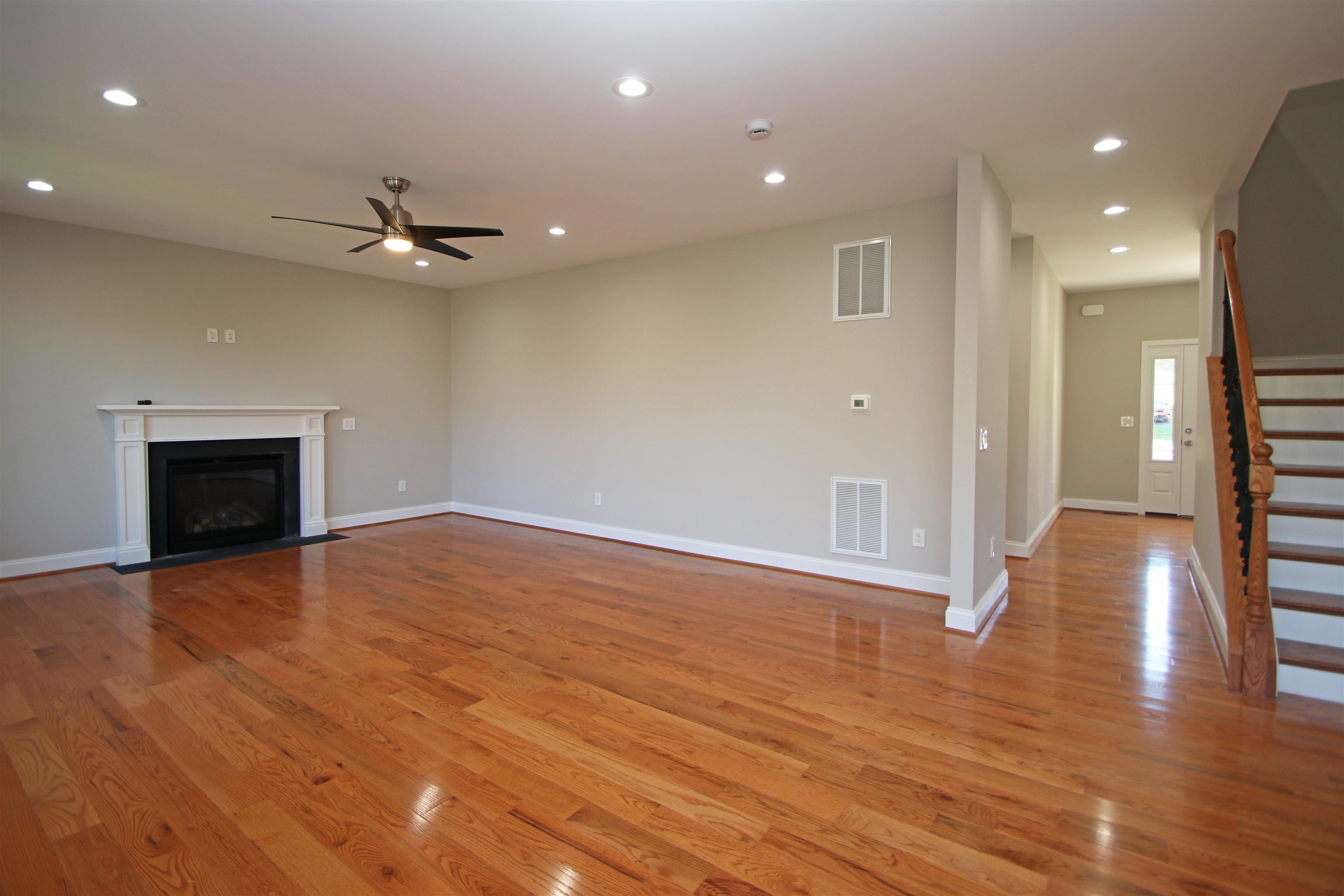 2060 Willow Hill Drive Harrisonburg, VA 22801 - Photo 5 of 43 a view of empty room with wooden floor and fireplace