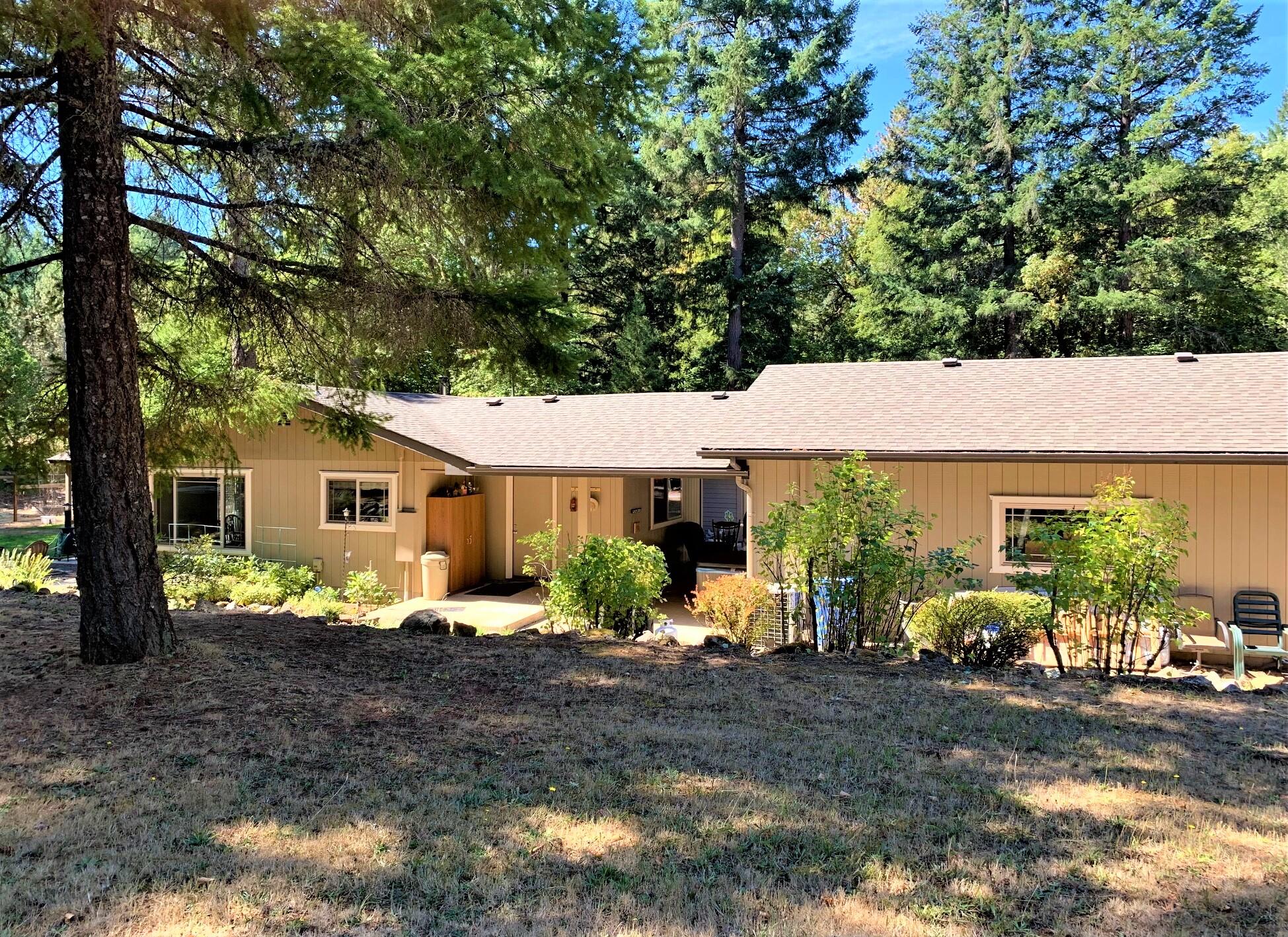 2793 Pleasant Creek Road Rogue River, OR 97537 - Photo 2 of 39 View from fruit trees in the orchard area looking towards the house
