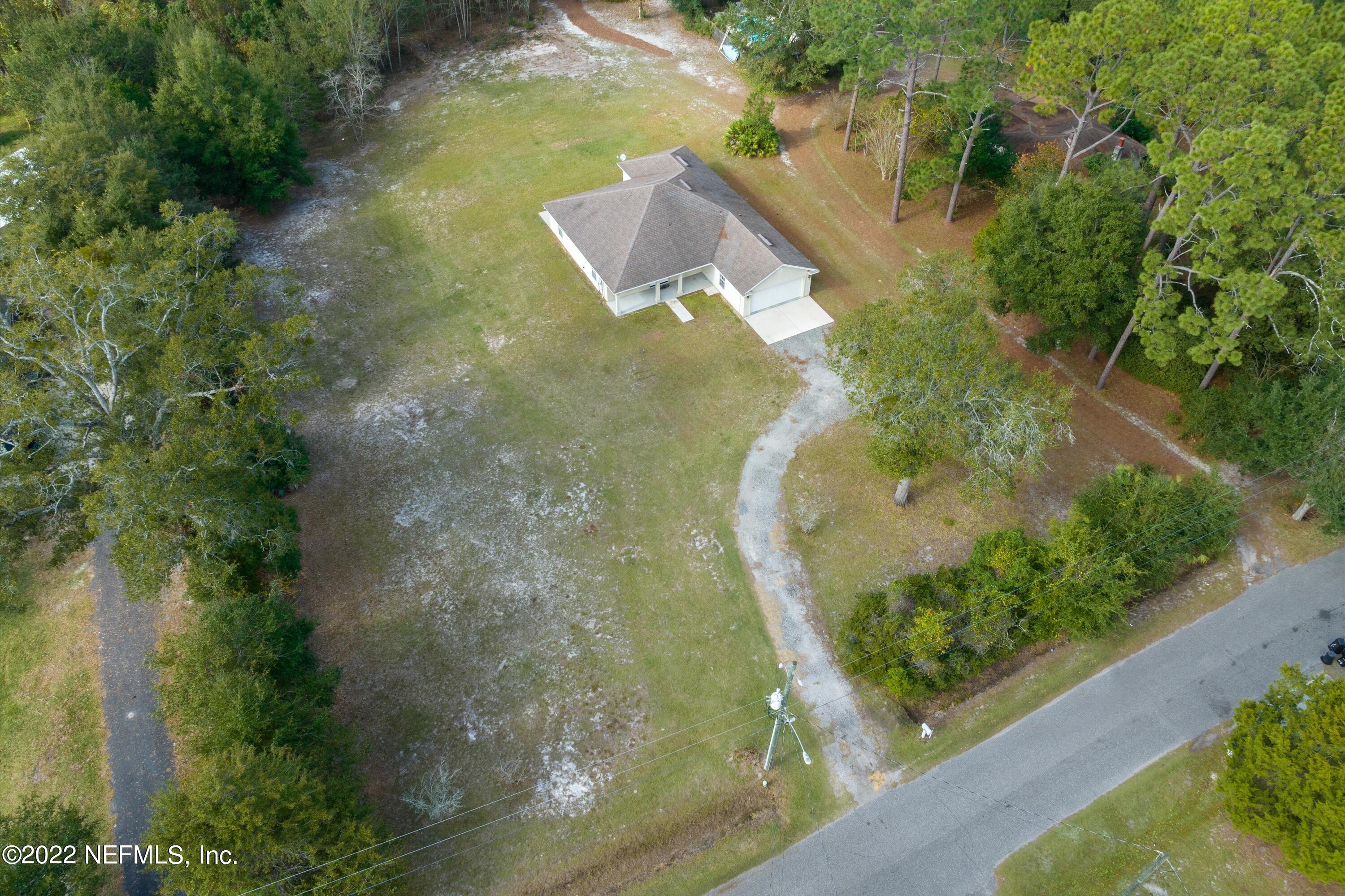 5306 Eulace Road Jacksonville, FL 32210 - Photo 27 of 30 an aerial view of a house with a yard