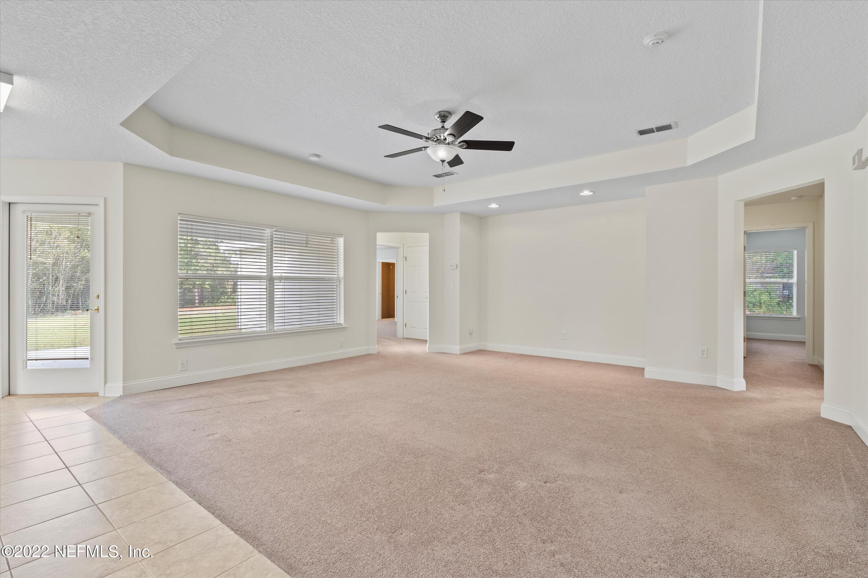 5306 Eulace Road Jacksonville, FL 32210 - Photo 7 of 30 a view of an empty room with a window