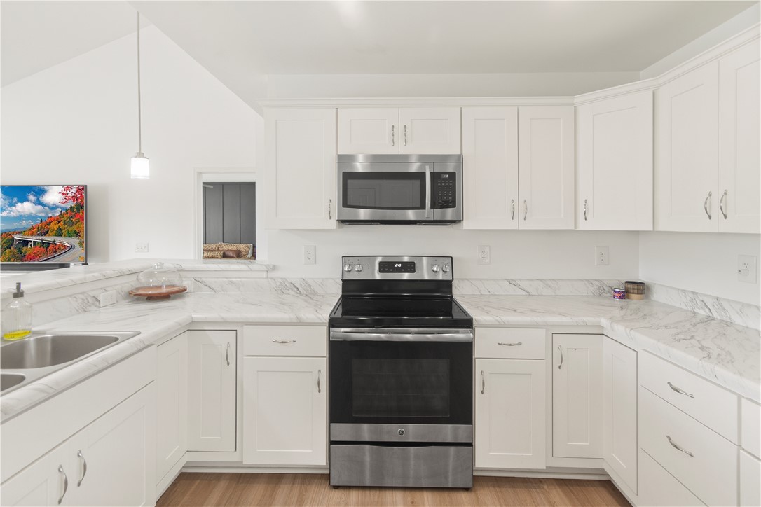 2900 Highway 187 Anderson, SC 29626 - Photo 14 of 41 Culinary aspirations find their home in this well-appointed kitchen featuring gleaming stainless steel appliances.