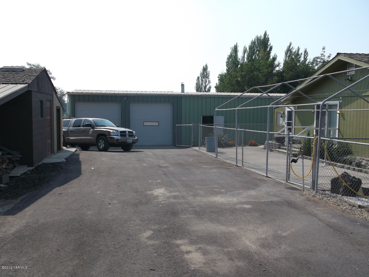 790 Murray Road Mabton, WA 98935 - Photo 10 of 18 a view of car parked on road with trees