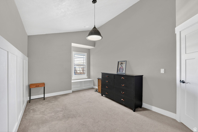 14714 South Bright Wood Road Herriman, UT 84096 - Photo 27 of 41 Carpeted bedroom 3 with vaulted ceiling and baseboards
