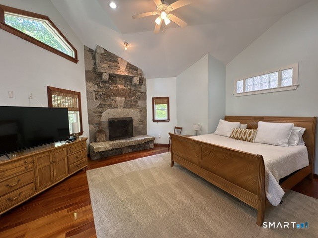 40 Looking Glass Hill Road Litchfield, CT 06750 - Photo 20 of 33 a spacious bedroom with a bed and a flat screen tv