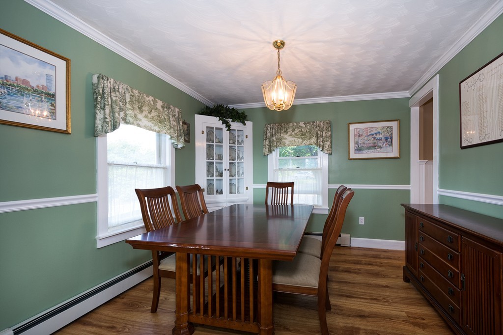65 Jericho Road Scituate, MA 02066 - Photo 15 of 26 a view of a dining room with furniture window and wooden floor