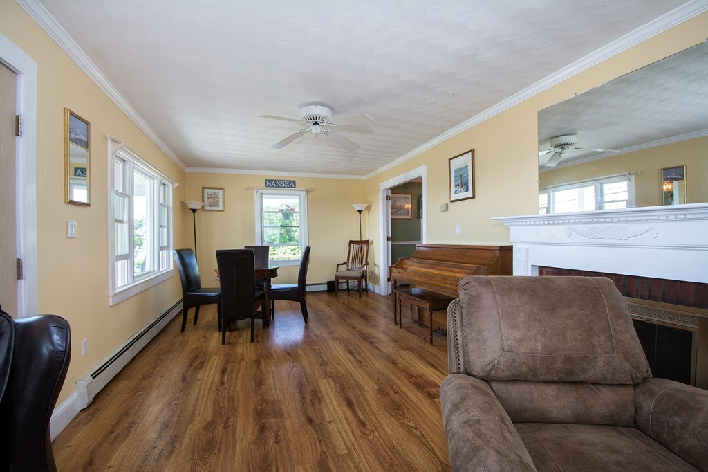 65 Jericho Road Scituate, MA 02066 - Photo 17 of 26 a living room with furniture and a wooden floor