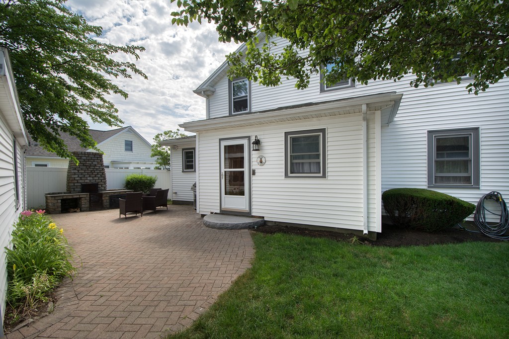65 Jericho Road Scituate, MA 02066 - Photo 10 of 26 a view of a house with a patio