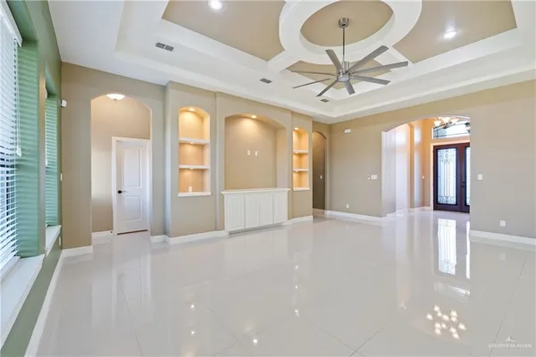 a kitchen with cabinets and oven