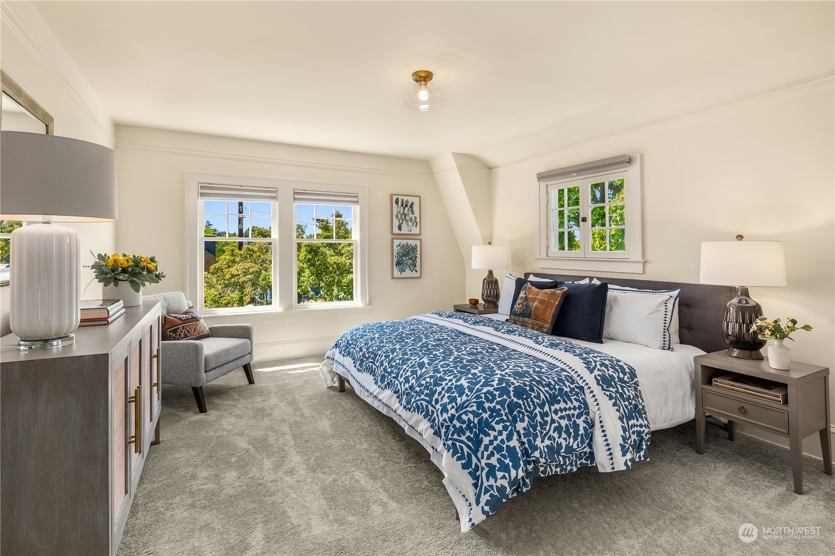 2536 1st Avenue West Seattle, WA 98119 - Photo 15 of 27 a bedroom with a bed and a couch
