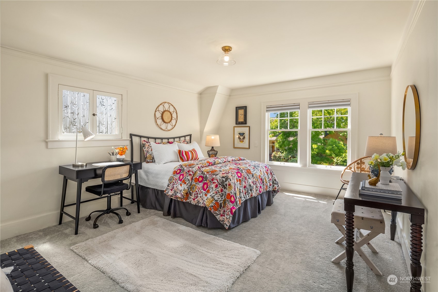 2536 1st Avenue West Seattle, WA 98119 - Photo 16 of 27 a bed room with a bed and a chair