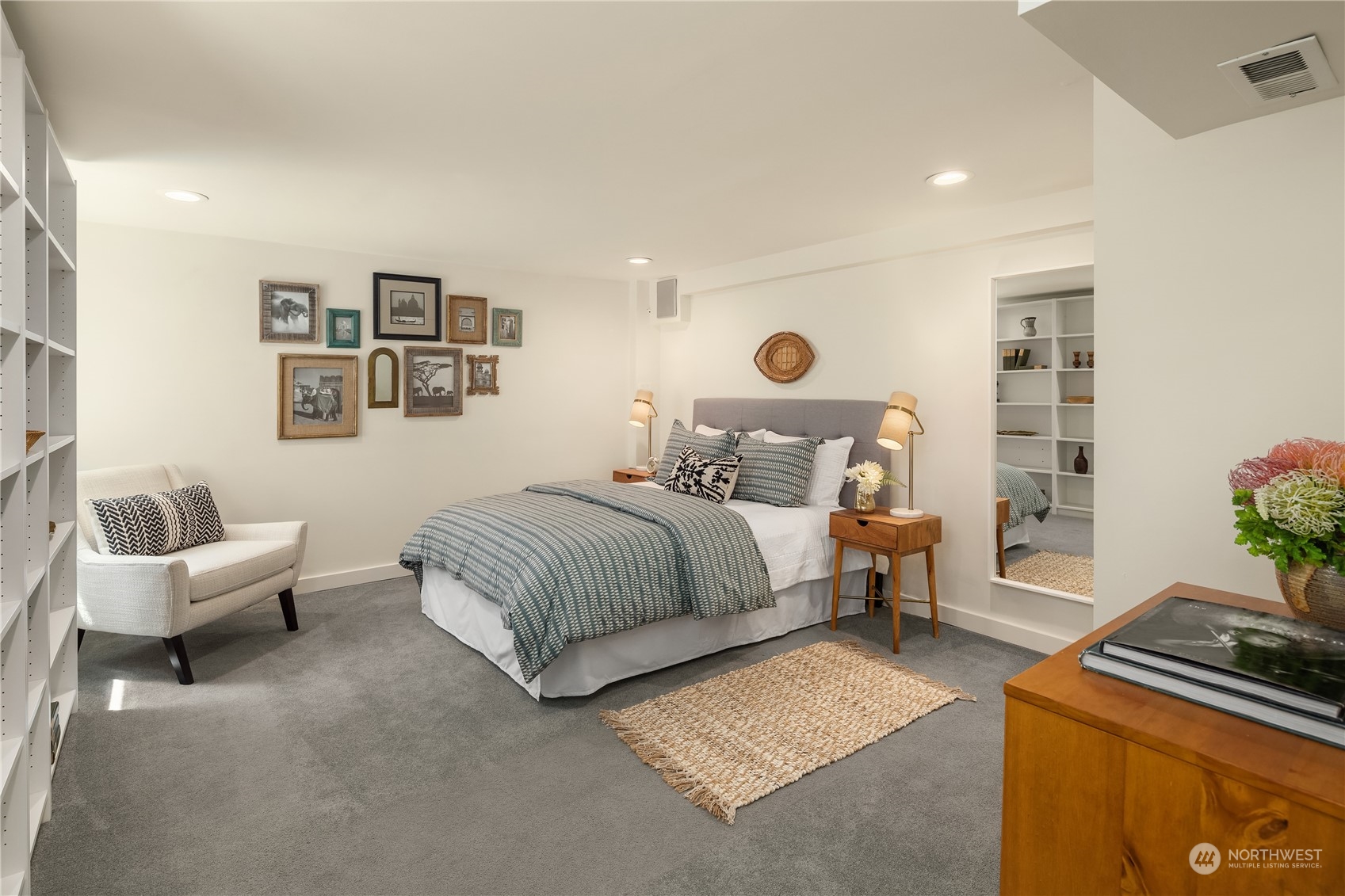 2536 1st Avenue West Seattle, WA 98119 - Photo 21 of 27 a bedroom with a bed and a couch