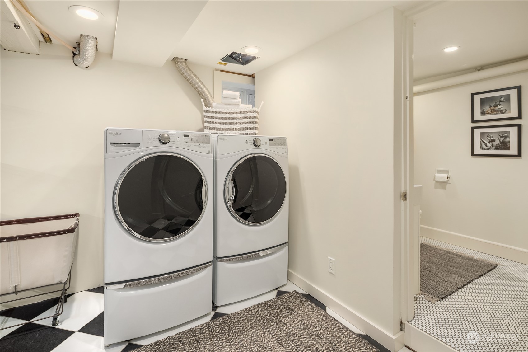 2536 1st Avenue West Seattle, WA 98119 - Photo 22 of 27 a utility room with dryer and washer