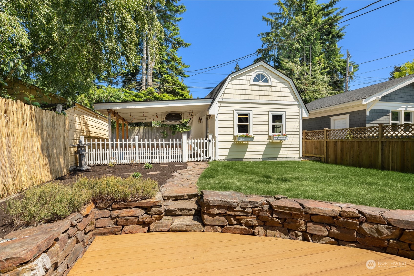 2536 1st Avenue West Seattle, WA 98119 - Photo 25 of 27 a front view of a house with a yard