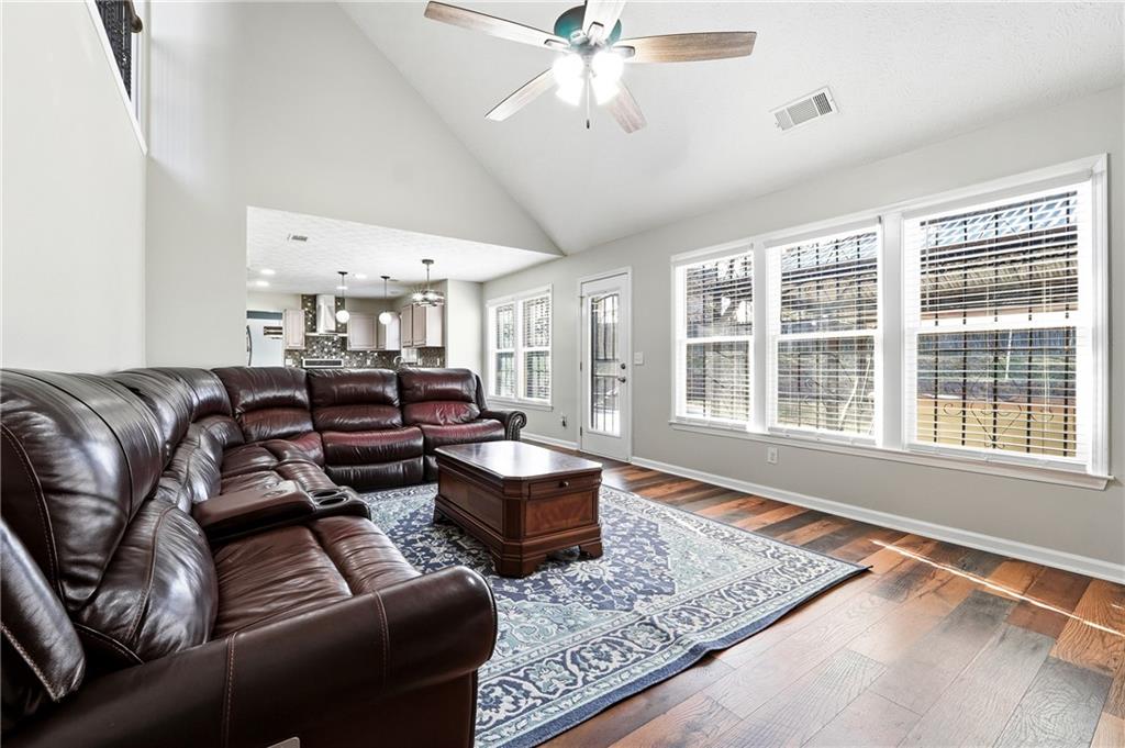 2964 Abbotts Oak Way Duluth, GA 30097 - Photo 13 of 29 a living room with furniture and a window