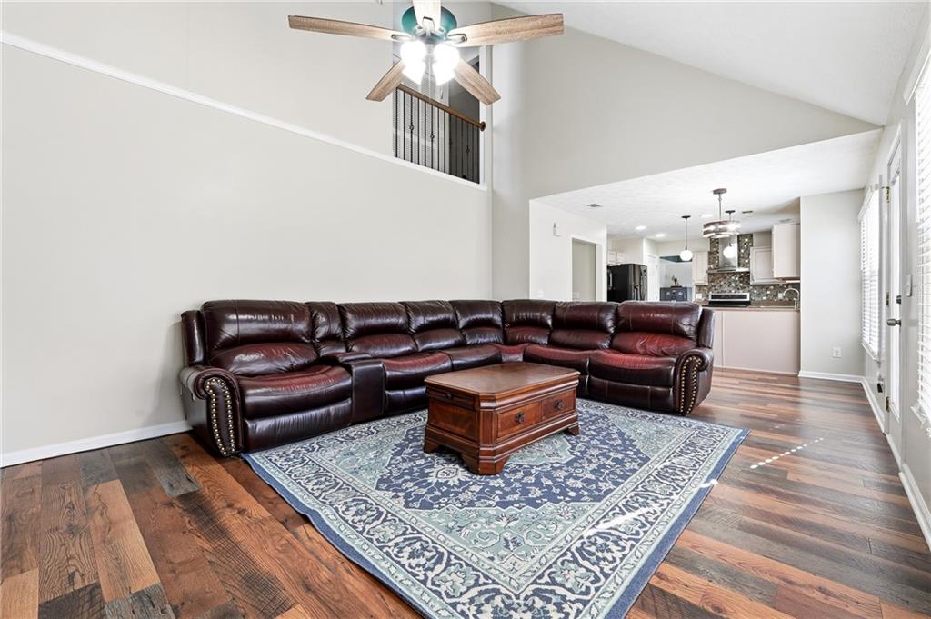2964 Abbotts Oak Way Duluth, GA 30097 - Photo 14 of 29 a living room with furniture and a rug
