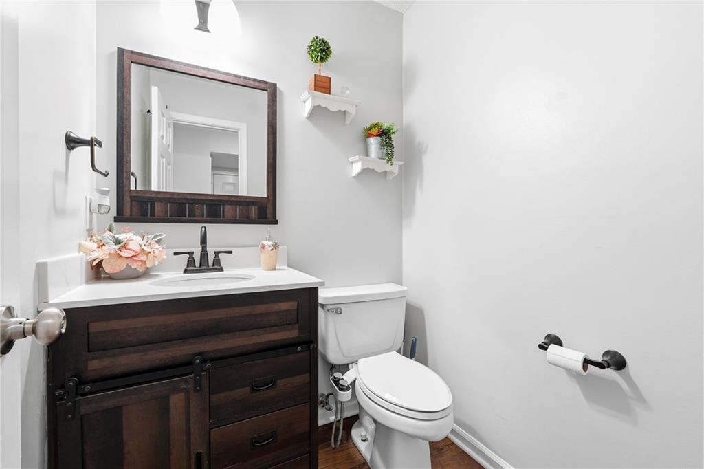 2964 Abbotts Oak Way Duluth, GA 30097 - Photo 19 of 29 a bathroom with a sink vanity and toilet