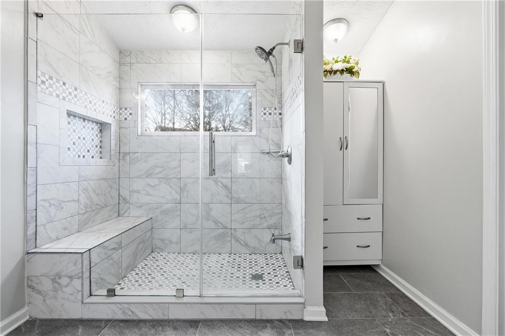 2964 Abbotts Oak Way Duluth, GA 30097 - Photo 23 of 29 a bathroom with a shower