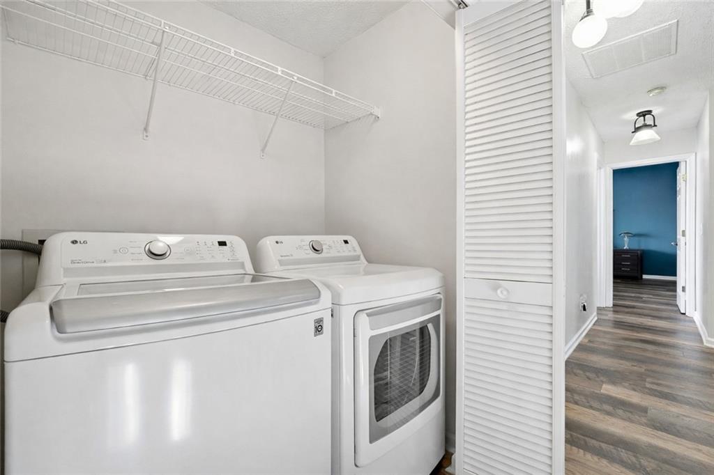 2964 Abbotts Oak Way Duluth, GA 30097 - Photo 27 of 29 a utility room with dryer and washer