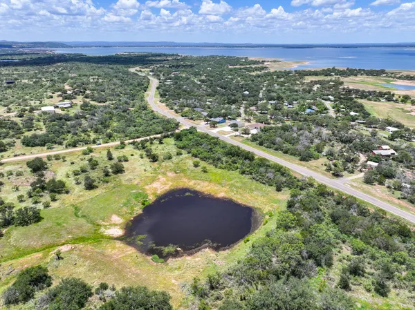 a view of a lake from a yard