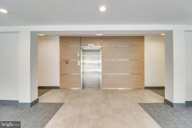 an empty room with walk in closet