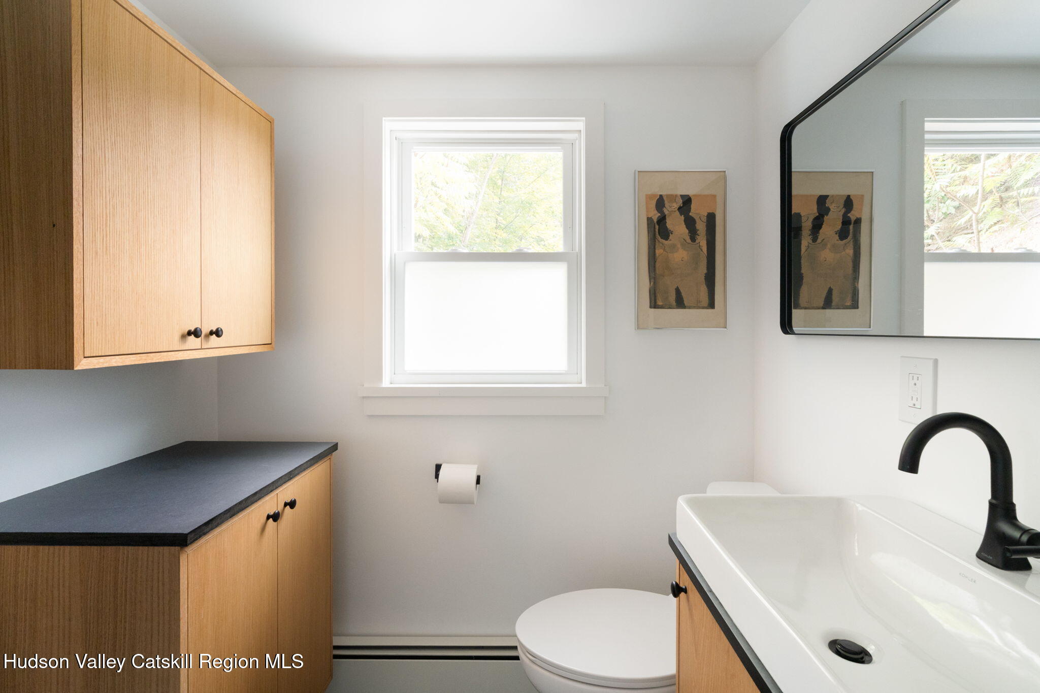442 Lapla Road Kingston, NY 12401 - Photo 16 of 26 a bathroom with a sink a toilet and a window