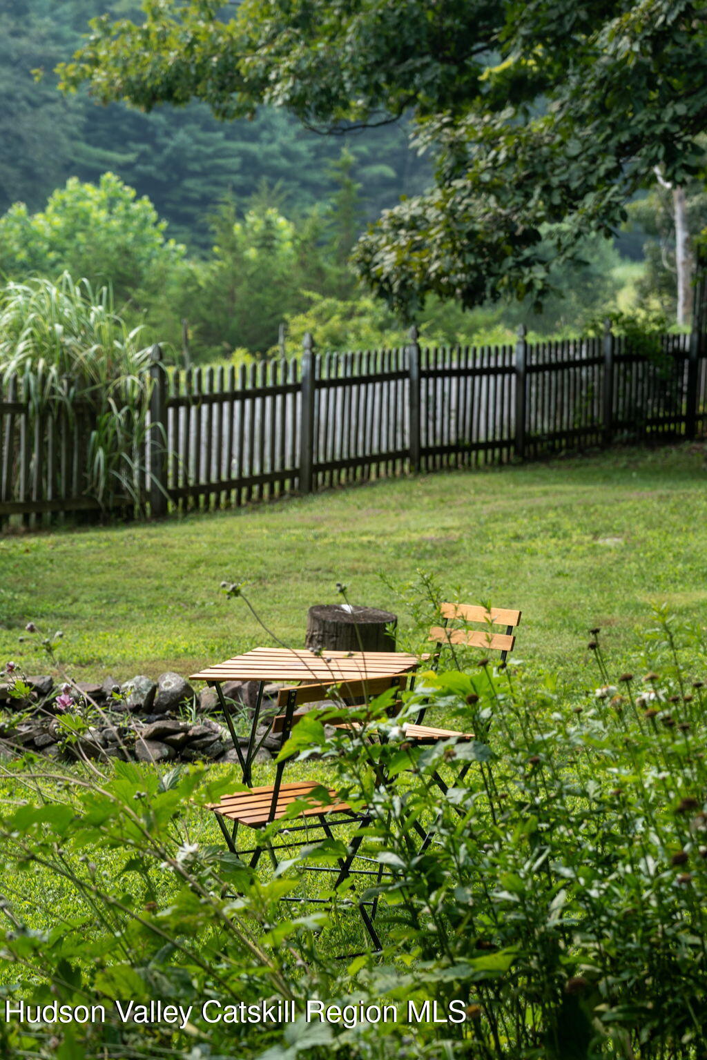 442 Lapla Road Kingston, NY 12401 - Photo 19 of 26 a view of backyard with deck and outdoor seating