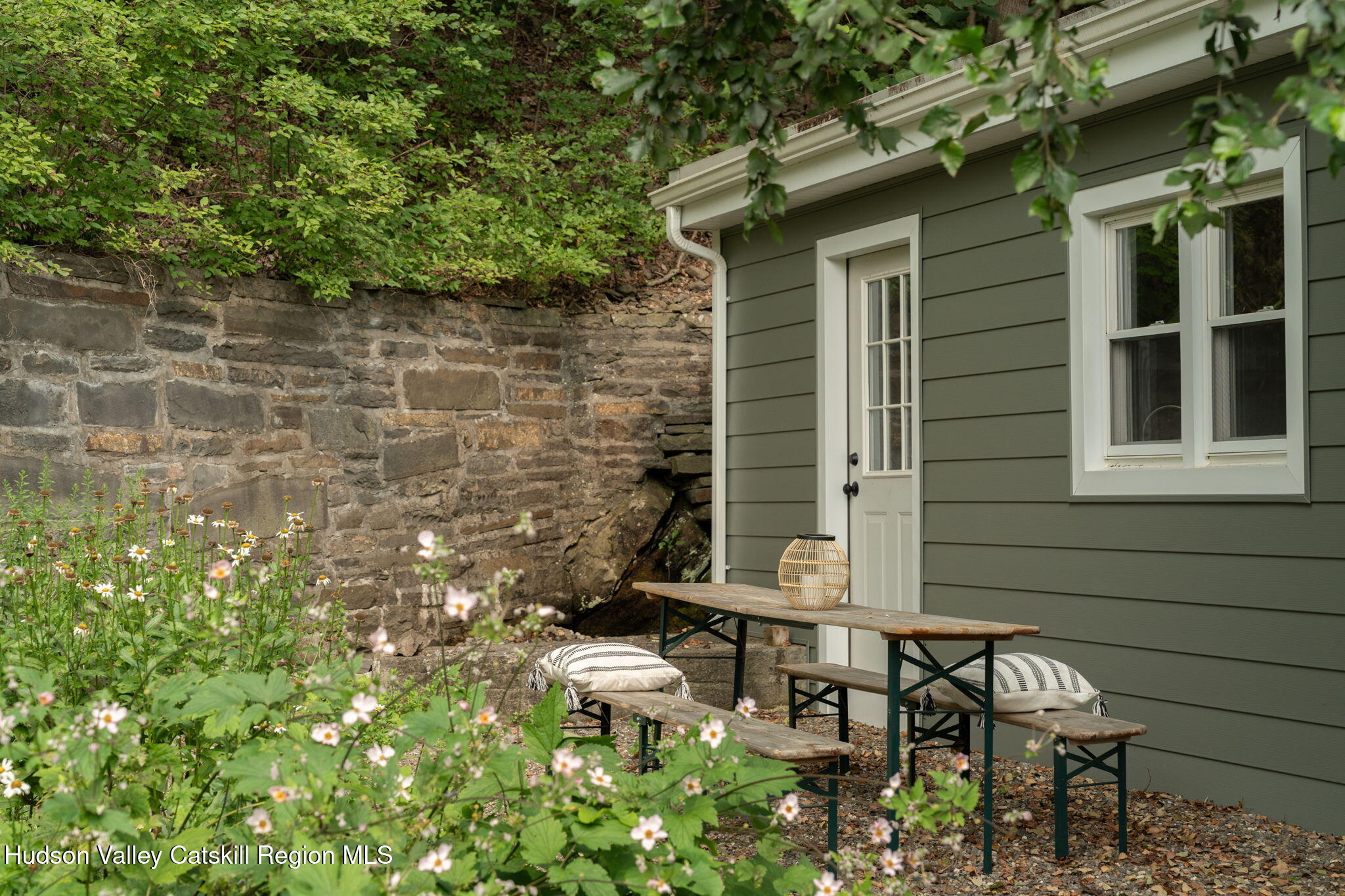 442 Lapla Road Kingston, NY 12401 - Photo 4 of 26 a front view of a house with outdoor seating