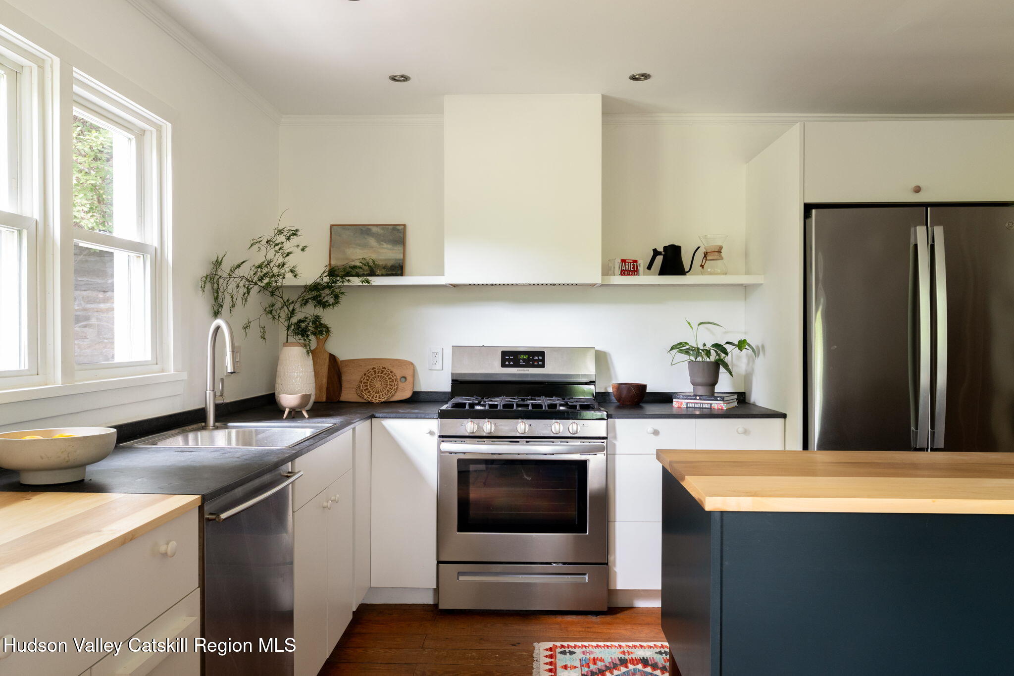 442 Lapla Road Kingston, NY 12401 - Photo 5 of 26 a kitchen with stainless steel appliances a stove a sink and a refrigerator