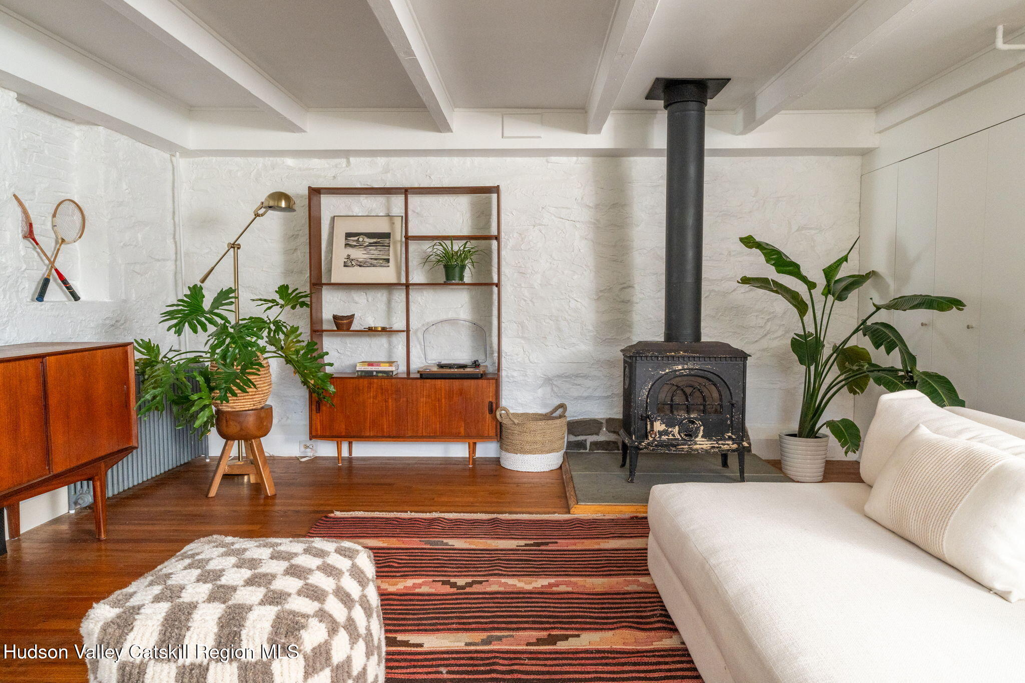442 Lapla Road Kingston, NY 12401 - Photo 9 of 26 a living room with furniture and a potted plant