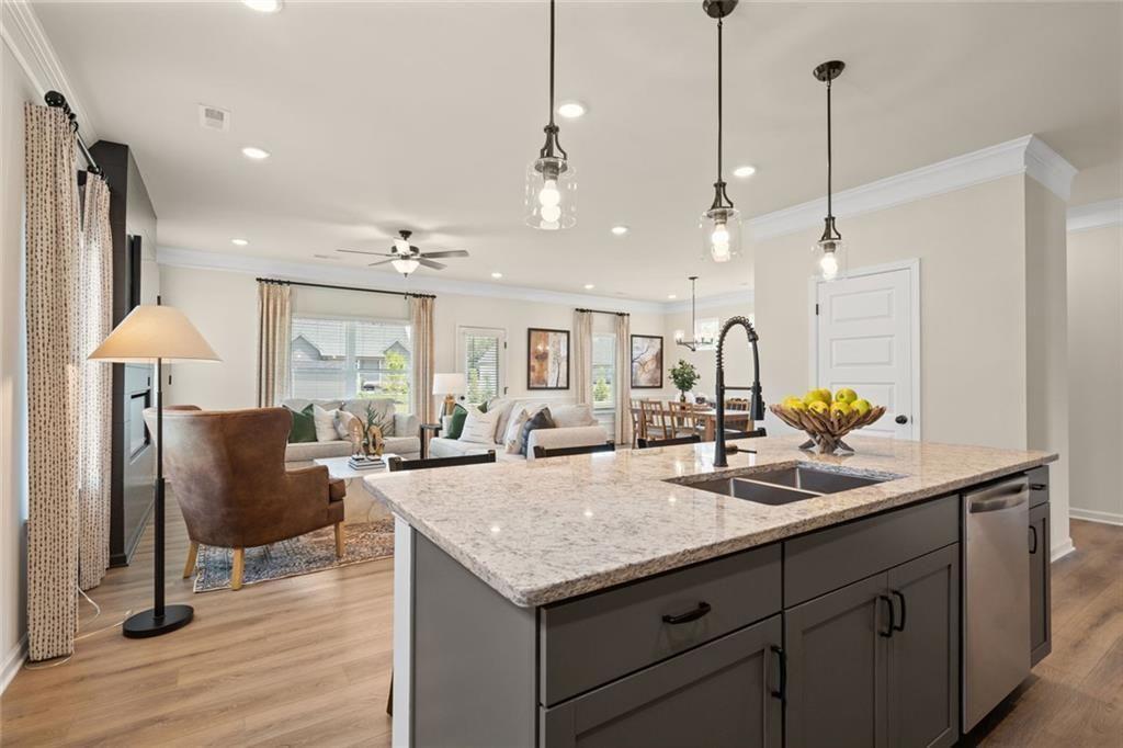 80 Cove Road Ringgold, GA 30736 - Photo 13 of 37 a kitchen with center island and stainless steel appliances