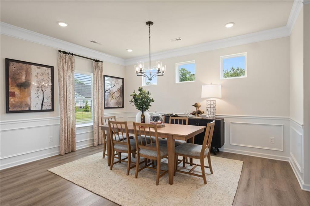 80 Cove Road Ringgold, GA 30736 - Photo 16 of 37 a view of a dining room with furniture window and wooden floor