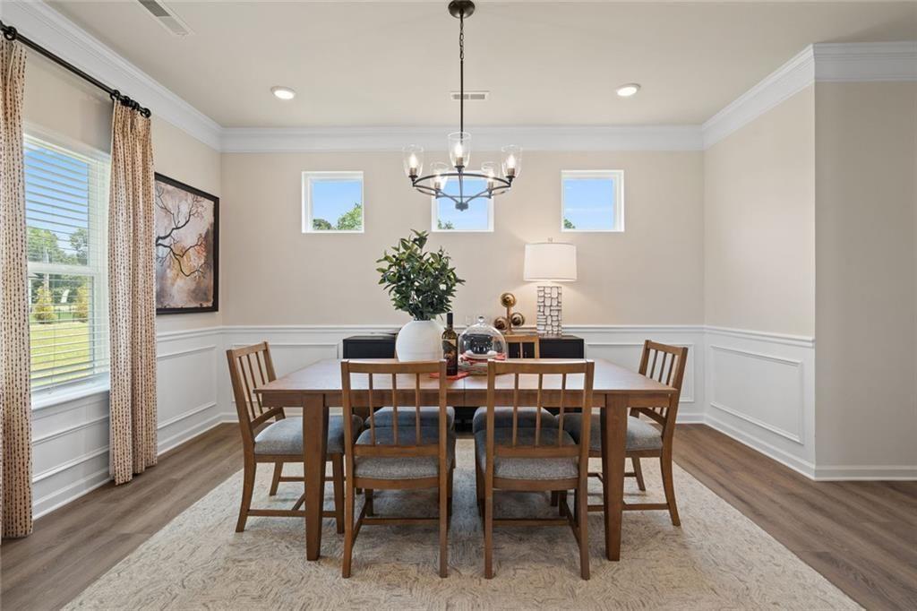 80 Cove Road Ringgold, GA 30736 - Photo 17 of 37 a view of a dining room with furniture window and wooden floor