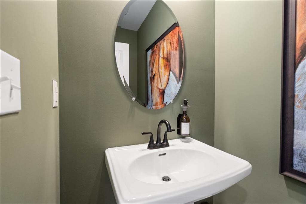 80 Cove Road Ringgold, GA 30736 - Photo 19 of 37 a bathroom with a sink and a mirror