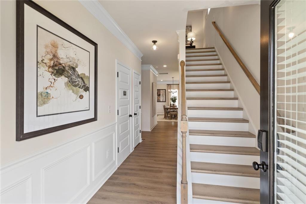 80 Cove Road Ringgold, GA 30736 - Photo 2 of 37 a view of a hallway with wooden floor and windows
