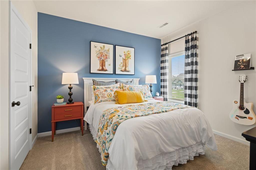 80 Cove Road Ringgold, GA 30736 - Photo 32 of 37 a bedroom with a bed and window