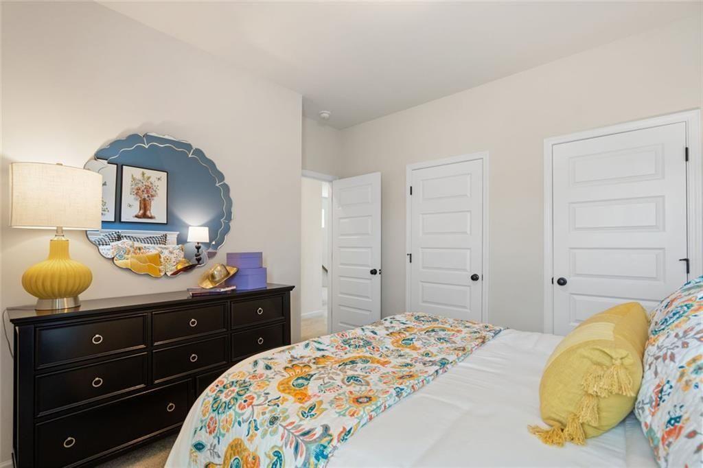 80 Cove Road Ringgold, GA 30736 - Photo 33 of 37 a bedroom with a bed and a dresser