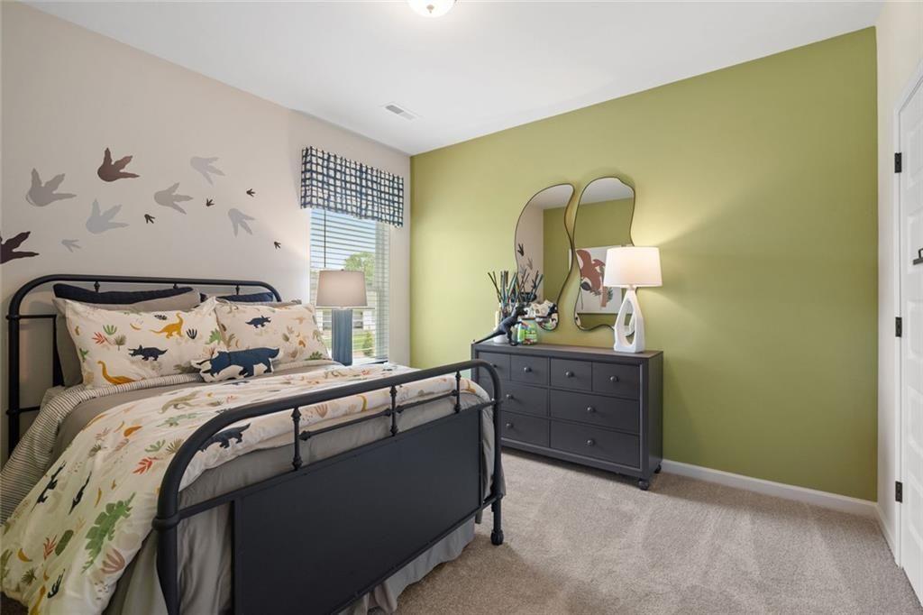 80 Cove Road Ringgold, GA 30736 - Photo 35 of 37 a bedroom with a bed and a dresser