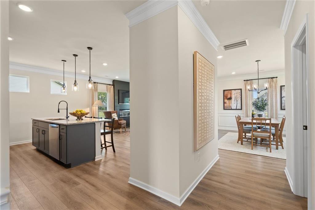 80 Cove Road Ringgold, GA 30736 - Photo 4 of 37 a kitchen with sink cabinets and wooden floor