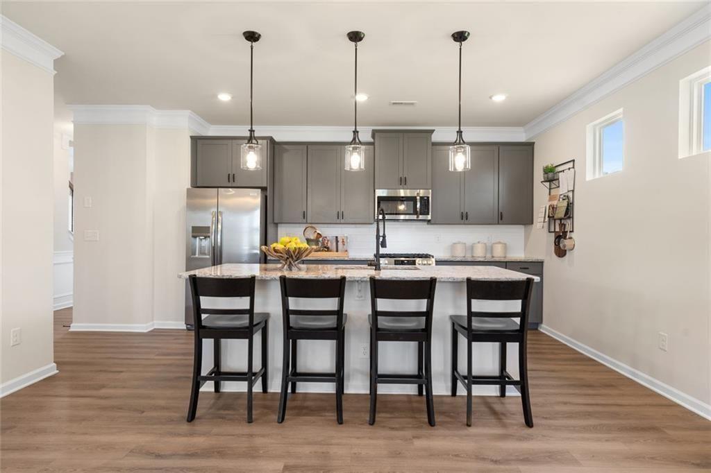 80 Cove Road Ringgold, GA 30736 - Photo 9 of 37 a kitchen with a table and chairs in it