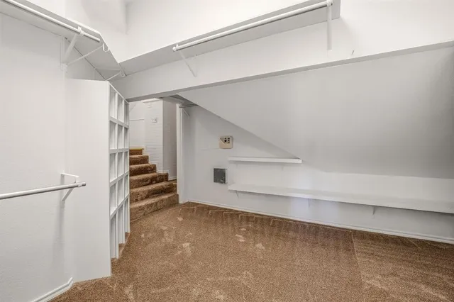 a view of a big room with wooden floor