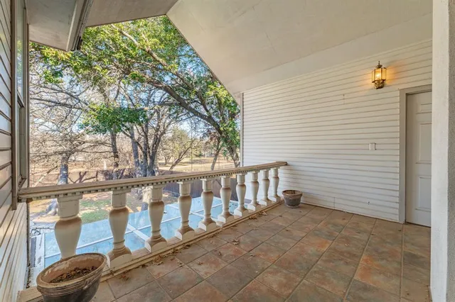 a view of jacuzzi with furniture