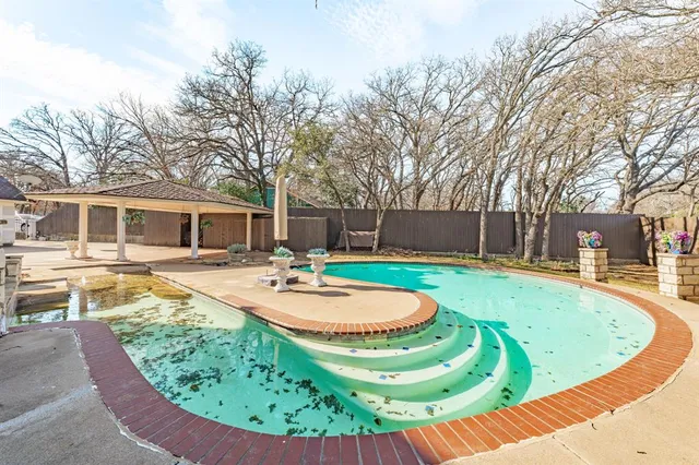 a view of outdoor space and a parking area
