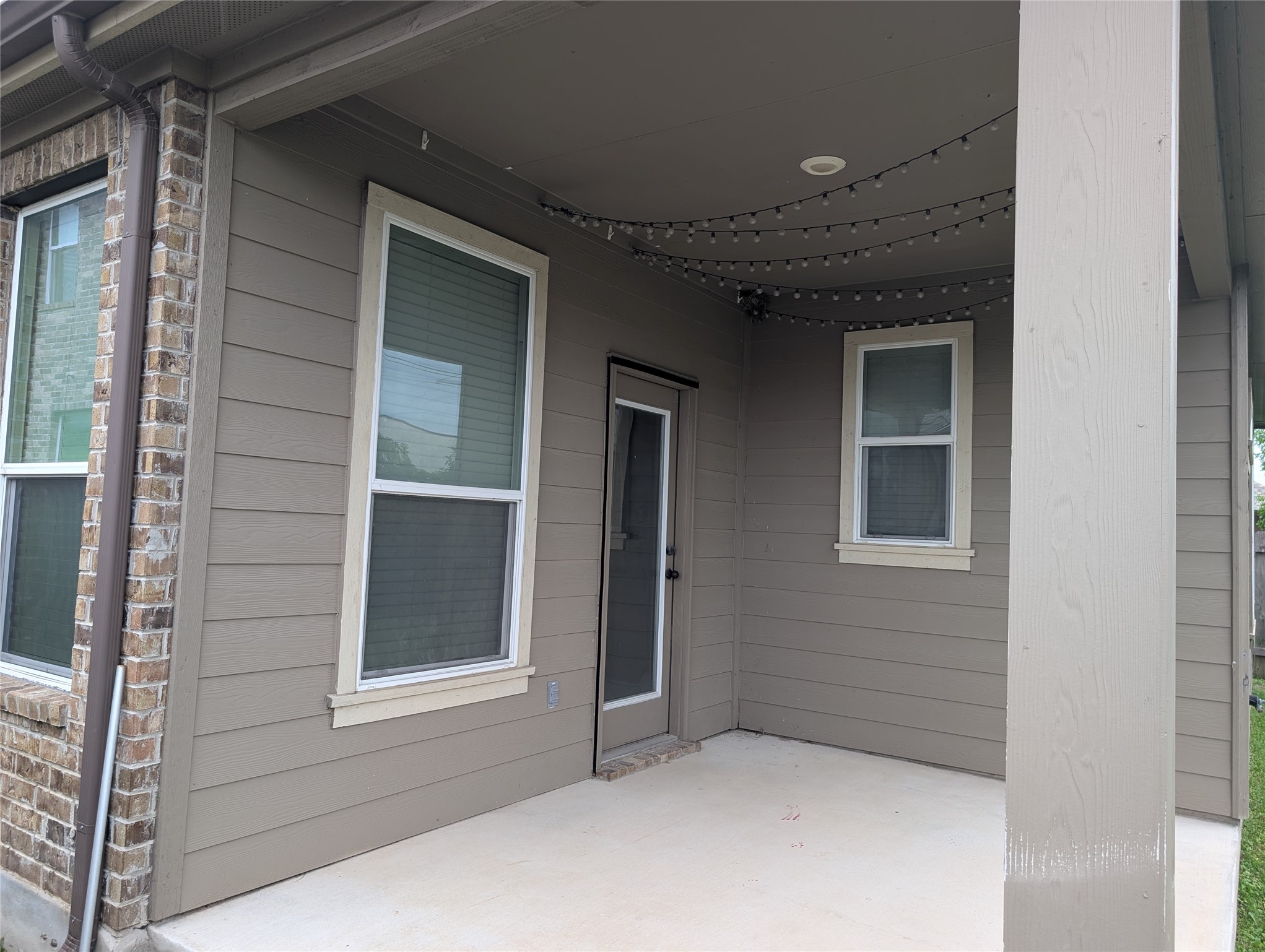 2471 Sunrise Road, Unit 8 Round Rock, TX 78664 - Photo 11 of 13 Covered patio featuring concrete flooring and a recessed light