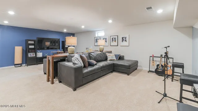 a living room with furniture pool and a table