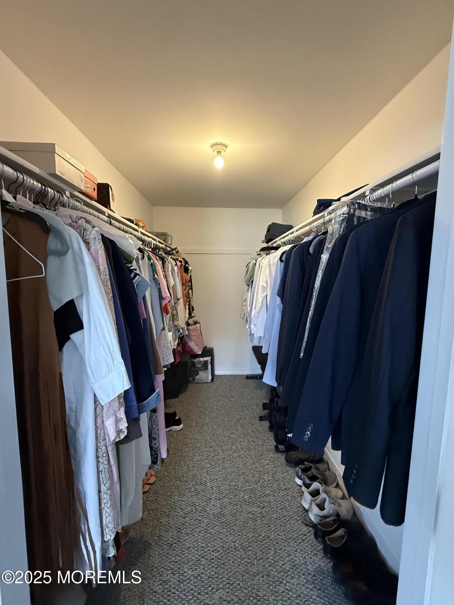 519 2nd Avenue Long Branch, NJ 07740 - Photo 14 of 24 a view of walk in closet with clothes and shoes
