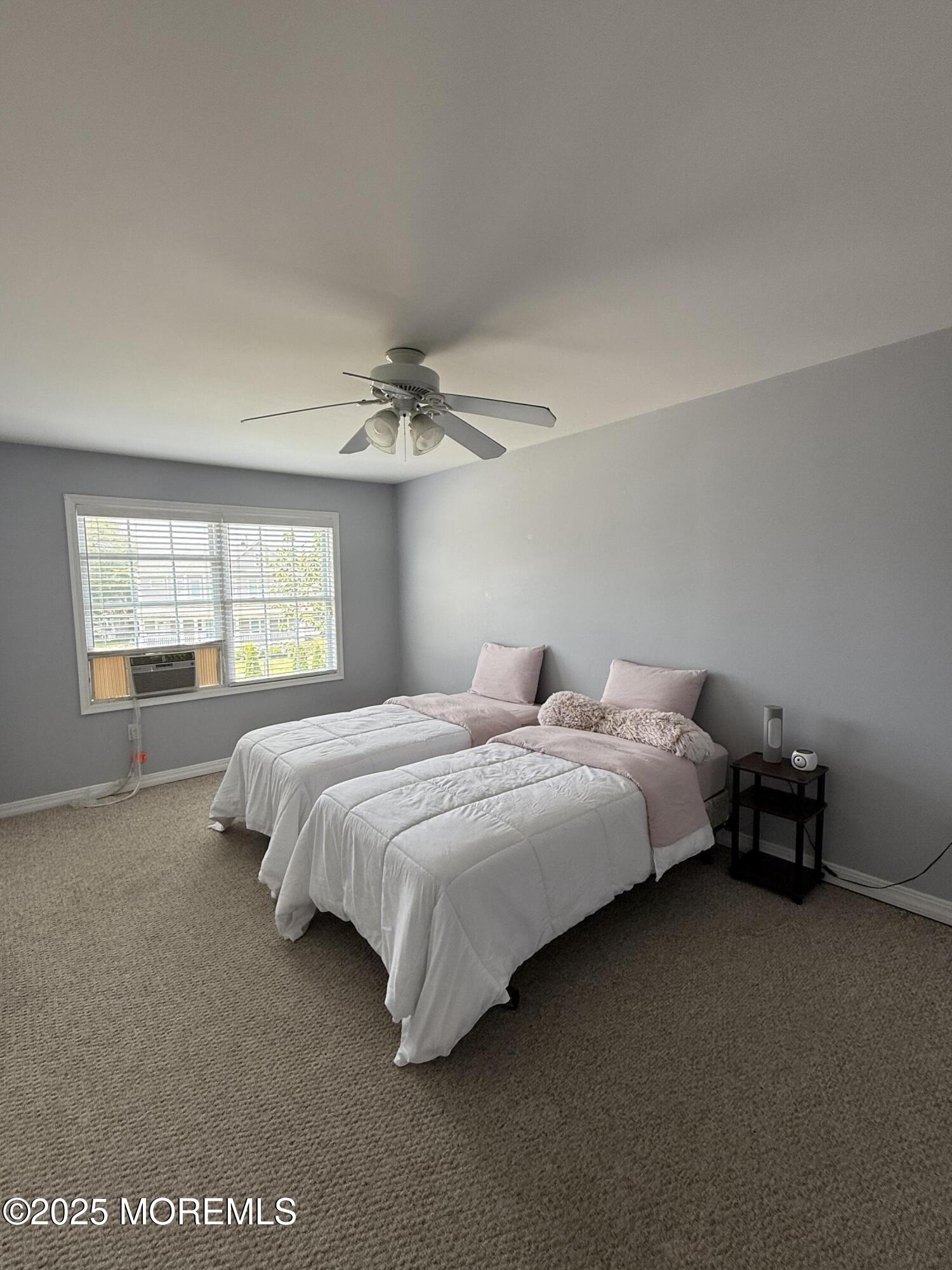 519 2nd Avenue Long Branch, NJ 07740 - Photo 16 of 24 a bedroom with bed and window