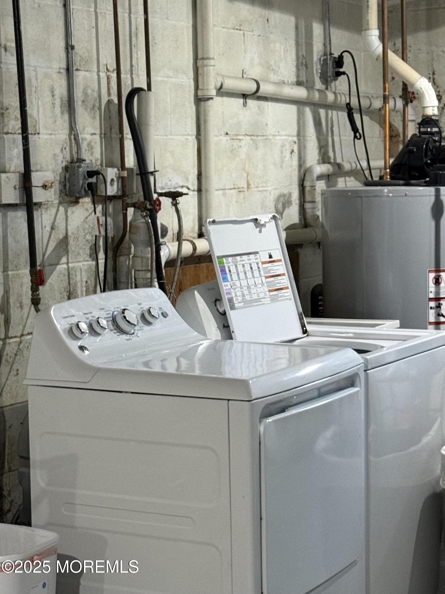 519 2nd Avenue Long Branch, NJ 07740 - Photo 23 of 24 a utility room with dryer and washer