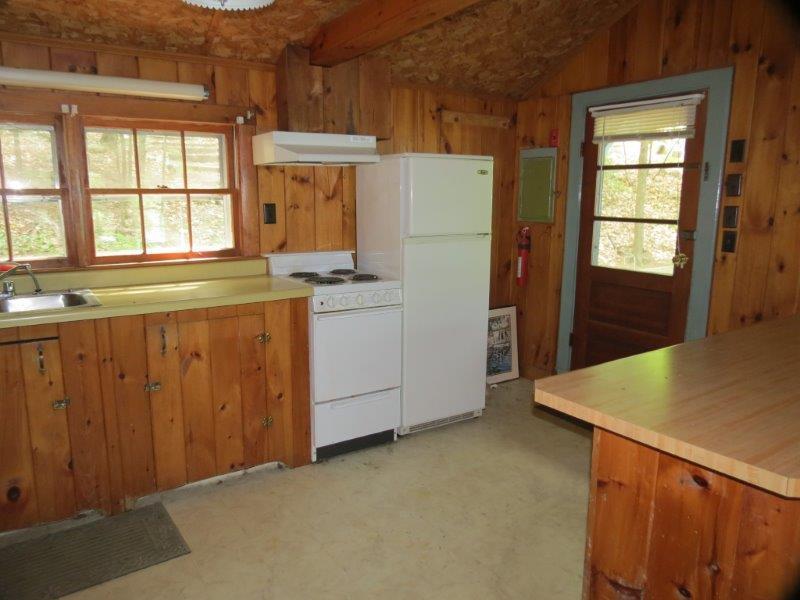 91 Coffee Pond Road Casco, ME 04015 - Photo 13 of 35 Stove and fridge included. Door...